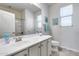 Bright bathroom with dual sinks, a large mirror, and plenty of counter space at 7363 E Plata Ave, Mesa, AZ 85212