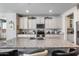 Kitchen island features granite countertops and a double sink at 7363 E Plata Ave, Mesa, AZ 85212