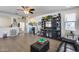 Spacious living room enhanced by modern flooring, with an open layout perfect for entertaining and relaxation at 7363 E Plata Ave, Mesa, AZ 85212