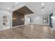 Spacious bedroom with custom wood paneling and ensuite bathroom at 8040 E Carol Way, Scottsdale, AZ 85260