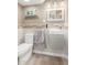 Stylish half bathroom features updated fixtures, a mirror, and a clean, modern design at 835 N Granite Reef Rd # 29, Scottsdale, AZ 85257