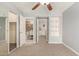 Bedroom featuring a closet, built-in shelves, and an attached bathroom at 835 N Granite Reef Rd # 29, Scottsdale, AZ 85257