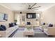 Modern living room filled with natural light, hardwood floors, and comfortable seating at 835 N Granite Reef Rd # 29, Scottsdale, AZ 85257
