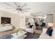 Open living room featuring natural lighting, modern decor, and hardwood floors at 835 N Granite Reef Rd # 29, Scottsdale, AZ 85257