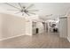 Open concept living room leading into kitchen and dining area at 835 N Granite Reef Rd # 29, Scottsdale, AZ 85257