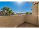 Outdoor patio area with views of nearby buildings and landscaping under a clear blue sky at 835 N Granite Reef Rd # 29, Scottsdale, AZ 85257