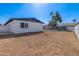 Large backyard with dirt area, sparkling pool, and privacy fence at 9028 N 48Th Dr, Glendale, AZ 85302