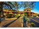 Charming property featuring desert landscaping, stone accents, and a welcoming entryway at 9716 E Mariposa Grande Dr, Scottsdale, AZ 85255