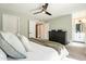 Inviting main bedroom with plenty of closet space, neutral tones, and access to the attached bathroom at 10903 E Sahuaro Dr, Scottsdale, AZ 85259