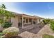 Cozy covered patio, perfect for outdoor relaxation with easy access to the yard at 11046 E Naranja Ave, Mesa, AZ 85209