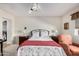 Cozy bedroom with ceiling fan, neutral tones, and comfortable furnishings at 11046 E Naranja Ave, Mesa, AZ 85209