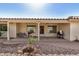 Covered patio with multiple ceiling fans, grills, and brick landscaping at 11046 E Naranja Ave, Mesa, AZ 85209