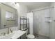 Bathroom with modern fixtures, stylish tile, and updated shelving at 1139 S 79Th St, Mesa, AZ 85208