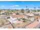 The aerial shot shows the expansive fenced backyard and covered patio at 11430 N 57Th Dr, Glendale, AZ 85304