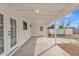 Covered patio with view to backyard and citrus tree at 11430 N 57Th Dr, Glendale, AZ 85304