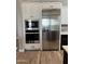 Stainless steel appliances including microwave, oven and fridge in kitchen at 11612 W Candelilla Way, Peoria, AZ 85383