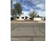 Single Gathering home with desert landscaping, a two car garage and neutral color palette at 1172 E Delano Dr, Casa Grande, AZ 85122