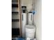 Water softener in an interior storage space at 1172 E Delano Dr, Casa Grande, AZ 85122