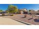 Front exterior view of a single-story home with desert landscaping on a sunny day at 14787 W Aster Dr, Surprise, AZ 85379