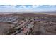 Extensive aerial view of a neighborhood with mountain views and an open landscape with some pools at 16060 S 4Th St, Phoenix, AZ 85048