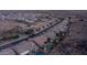 Stunning aerial view of a desert neighborhood featuring tile roofs, pools and beautiful desert landscape at 16060 S 4Th St, Phoenix, AZ 85048