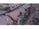 View of an estate showcasing a sparkling pool, covered patio, mature landscaping and a private backyard at 16060 S 4Th St, Phoenix, AZ 85048