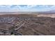 Panoramic aerial view of residential community and open landscape with mountain views and blue sky at 16060 S 4Th St, Phoenix, AZ 85048