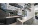 Modern kitchen with white countertops, dark cabinets, and sleek island at 16060 S 4Th St, Phoenix, AZ 85048