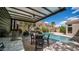 Outdoor kitchen and pool area with mountain views and desert landscaping at 16060 S 4Th St, Phoenix, AZ 85048