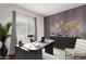 Modern office space with stylish desk, chair, and decorative world map, creating an inspiring work environment at 16549 W Rowel Rd, Surprise, AZ 85387