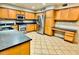 Spacious kitchen features stainless steel appliances and ample counter space at 17059 W Northampton Rd, Surprise, AZ 85374