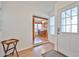 Welcoming entryway featuring a view into the dining area and a convenient side table at 17200 W Bell Rd # 1185, Surprise, AZ 85374