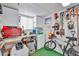 Well-organized garage featuring workspace, ample storage, and a mountain bike at 17200 W Bell Rd # 1185, Surprise, AZ 85374