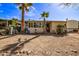 Desert home featuring landscaping and blue skies at 17200 W Bell Rd # 119, Surprise, AZ 85374