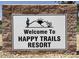 Entrance sign to Happy Trails Resort at 17200 W Bell Rd # 119, Surprise, AZ 85374