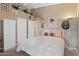 Spacious bedroom featuring neutral walls, carpet, ceiling fan, and closet for a serene and comfortable ambiance at 18932 N 89Th Way, Scottsdale, AZ 85255