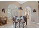 Inviting dining area with stylish furnishings and plenty of natural light at 18932 N 89Th Way, Scottsdale, AZ 85255