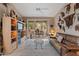 Cozy living room features neutral colors, tile flooring, and seamless access to the outdoor patio at 18932 N 89Th Way, Scottsdale, AZ 85255