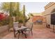 Back patio with outdoor seating, grill, and desert landscaping creating an ideal outdoor living and dining space at 18932 N 89Th Way, Scottsdale, AZ 85255