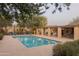 Community pool area with lounge chairs and covered seating, perfect for relaxing and enjoying the outdoors at 18932 N 89Th Way, Scottsdale, AZ 85255