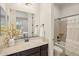 Bathroom featuring granite countertop vanity, mirror and shower/tub combo at 20216 E Sunset Ct, Queen Creek, AZ 85142