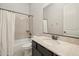 Bathroom featuring modern countertop, tiled shower and convenient layout at 20216 E Sunset Ct, Queen Creek, AZ 85142