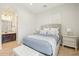 Cozy bedroom with ensuite bathroom access and neutral color palette at 20216 E Sunset Ct, Queen Creek, AZ 85142