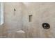 Tiled shower featuring a built-in niche at 20216 E Sunset Ct, Queen Creek, AZ 85142