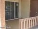 This is an exterior shot with a window, door, and decorative concrete railing in front of a building at 2121 W Royal Palm Rd # 1116, Phoenix, AZ 85021