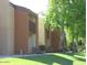 Charming apartment complex featuring well-maintained landscaping, patios, and two-story buildings at 2121 W Royal Palm Rd # 1116, Phoenix, AZ 85021