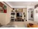 Living room with fireplace, TV, and stylish decor, creating a cozy and inviting atmosphere at 22569 W Lasso Ln, Buckeye, AZ 85326