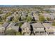 Wide aerial view of a residential neighborhood with consistent architecture and mature landscaping at 2331 E Pecan Rd, Phoenix, AZ 85040