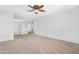 Versatile bonus room with neutral carpet flooring, a ceiling fan, and great natural light at 2331 E Pecan Rd, Phoenix, AZ 85040