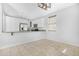 An inviting kitchen area with white cabinets, stainless steel appliances, and granite countertops at 2331 E Pecan Rd, Phoenix, AZ 85040